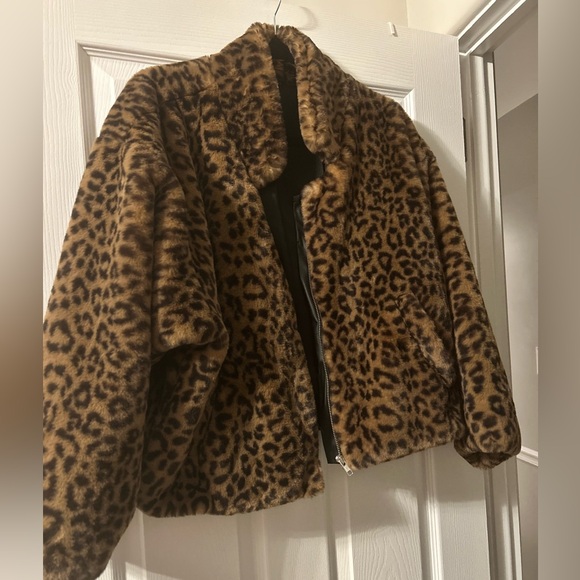 Free People Jackets & Blazers - Free people cheetah print coat. Size M with leather black trim. Very soft